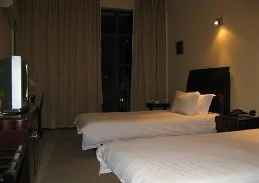 Baolong Homelike Hotel (Luojing Branch)