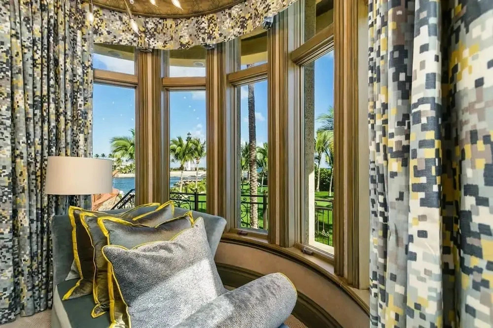 Luxurious 3-story Estate With Gym Pool Slide Private Beach and Lighthouse Views