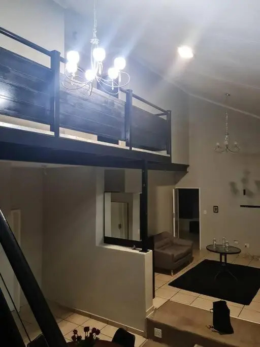 Justin's Place Lounge. An Exceptional Home with no Load Shedding, by The Grove Mall and Wilgers Hospital.