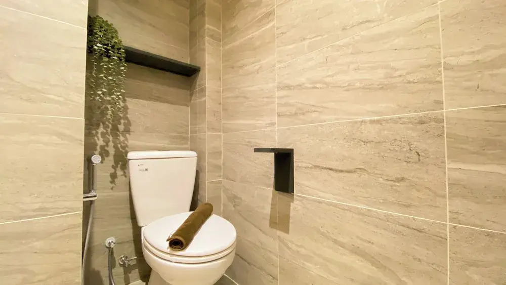 Elegant 2BR Loft Garden Villa at Collins Boulevard Apartment