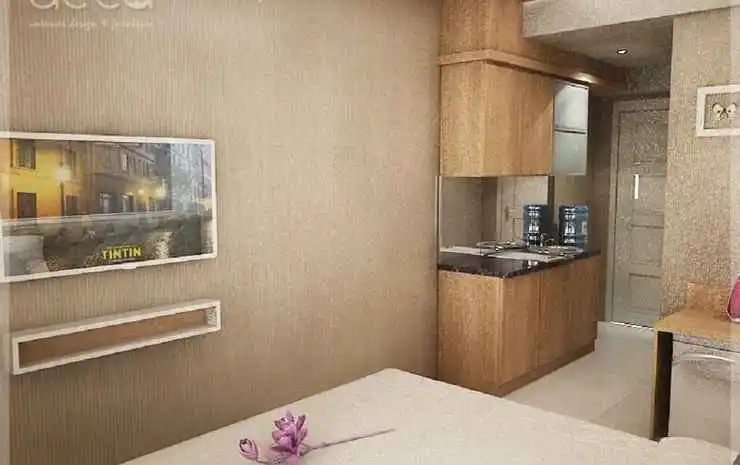 Studio Room at Cosmy Orchard Apartment