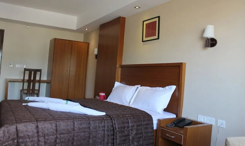 Itsy By Treebo - Greenwood Inn And Suites Near Mysore Palace