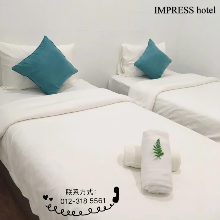 IMPRESS HOTEL