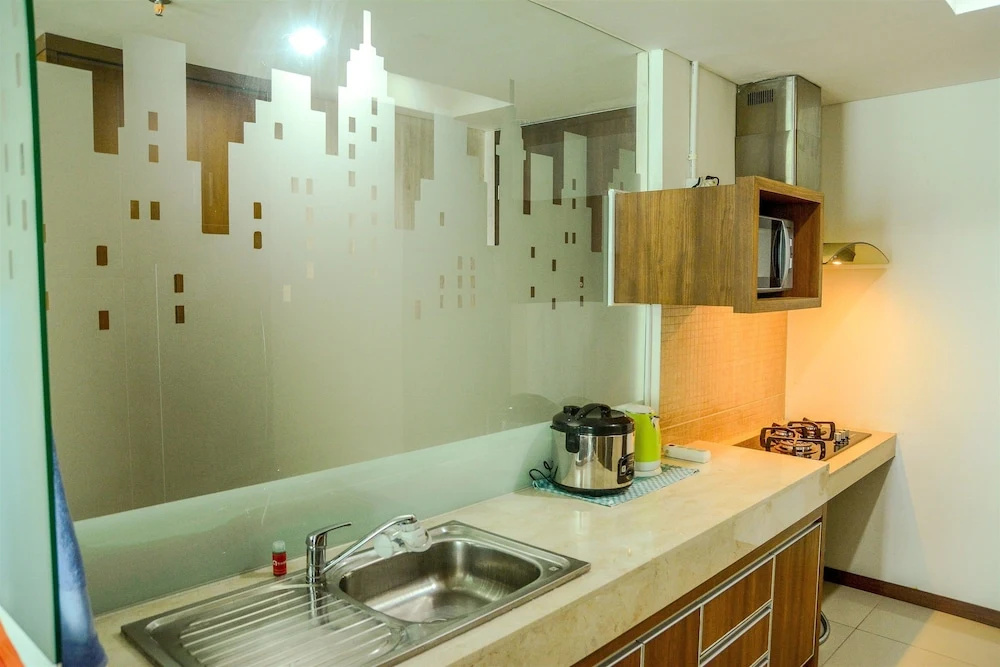 Cozy Pool View Kemang Village Residence Apartment with Direct Access To Mall