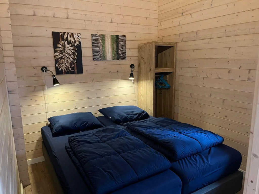 Wooden chalet with microwave, on a holiday park near three national parks