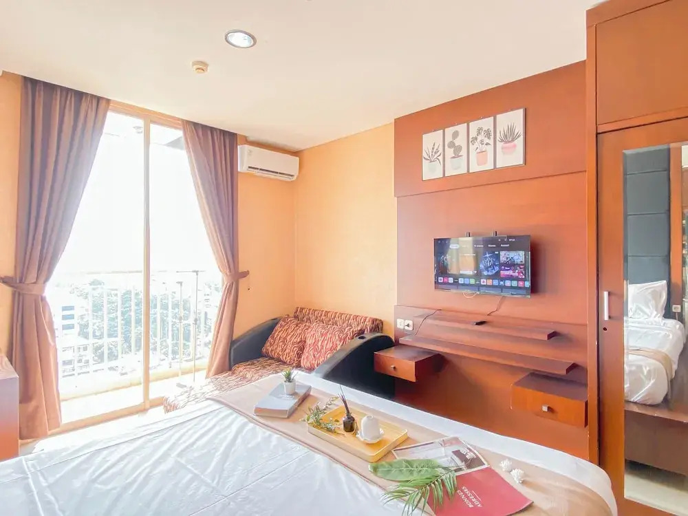 Warm Wood Accents Studio At Mangga Dua Apartment