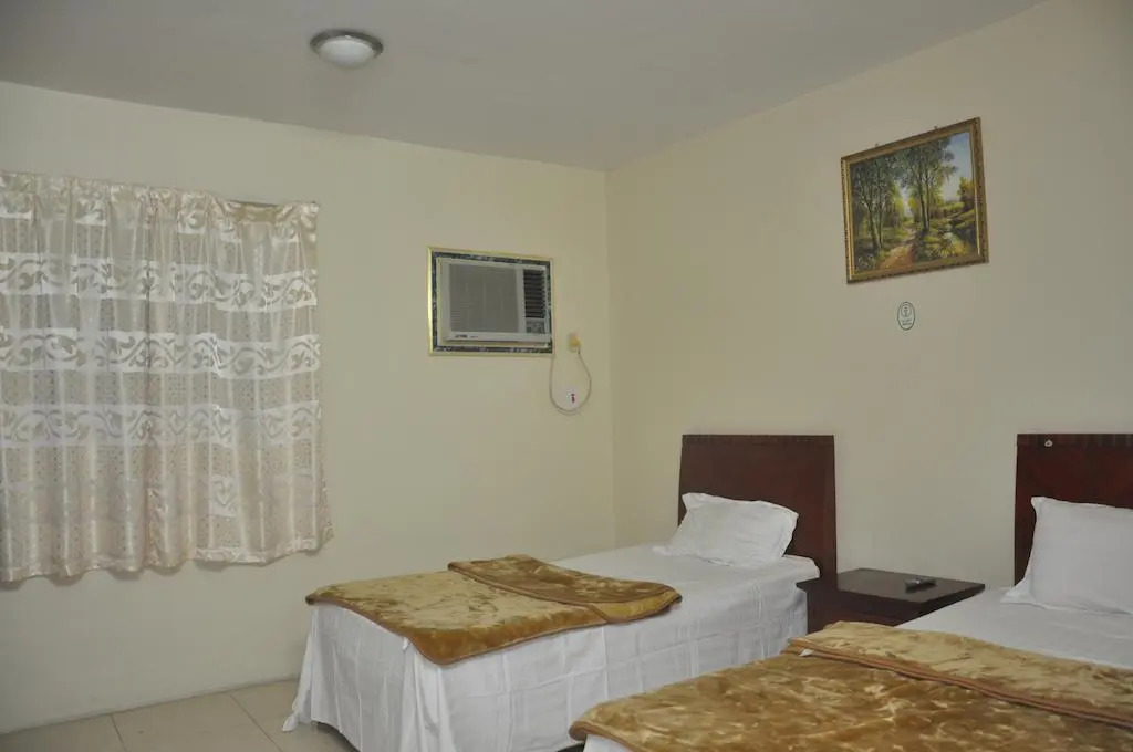 Al Buainain Apartments-Al Madrasah Hotel