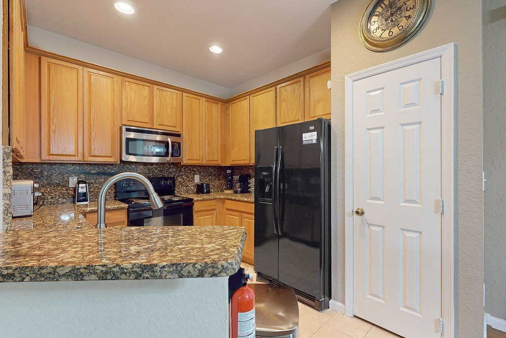 Updated Retreat With Pool Access, W/d, AC, & Patio - Close to Disney Parks