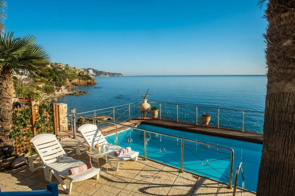 Exclusive Seaside Retreat with Shared Pool & Private Beach Access