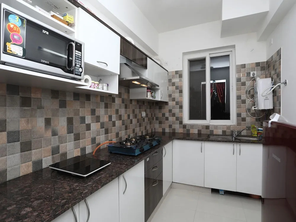 OYO 13172 Home Exotic 1BHK Pacific Golf Estate