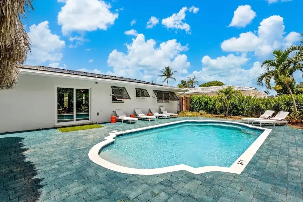 Eccentric Home With Pool Tiki hut Outdoor Kitchen