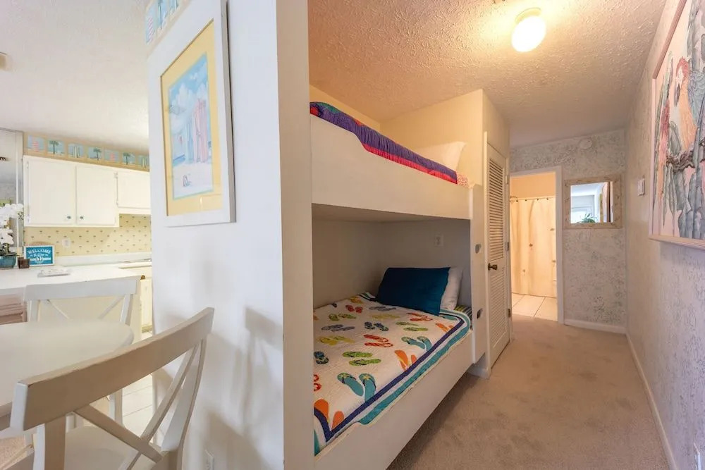 Sun Kissed Beachside Condo With Pool