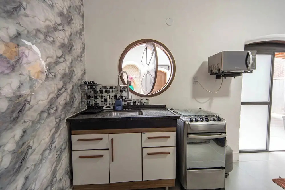 Casa com Piscina e Churrasqueira a 220 m da Praia