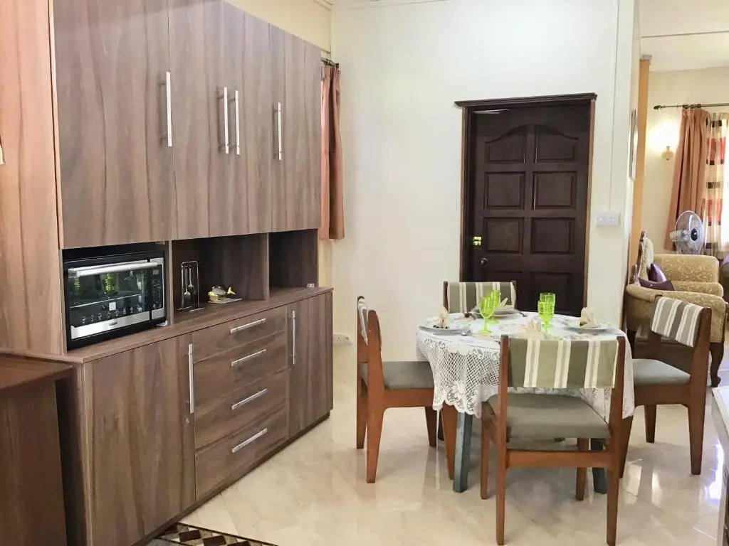 Cardamon Villa is a 2 bedroom with 1 bathroom and seperate toilet detached house with AC and swimming pool , 5 minutes walk from Flic en Flac public beach