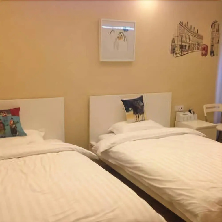 Yueming Holiday Apartment Hotel