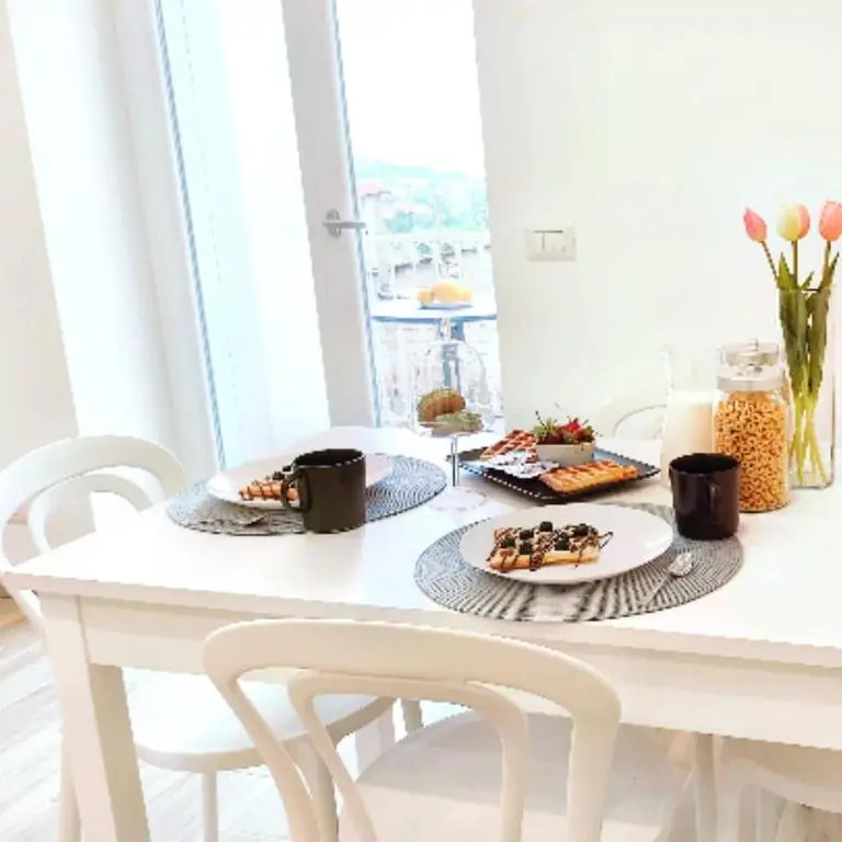 FOUR WHITE APARTMENTS