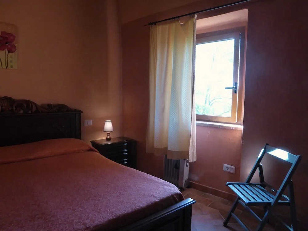 Holiday home in Canossa with Swimming Pool, Garden, Barbecue