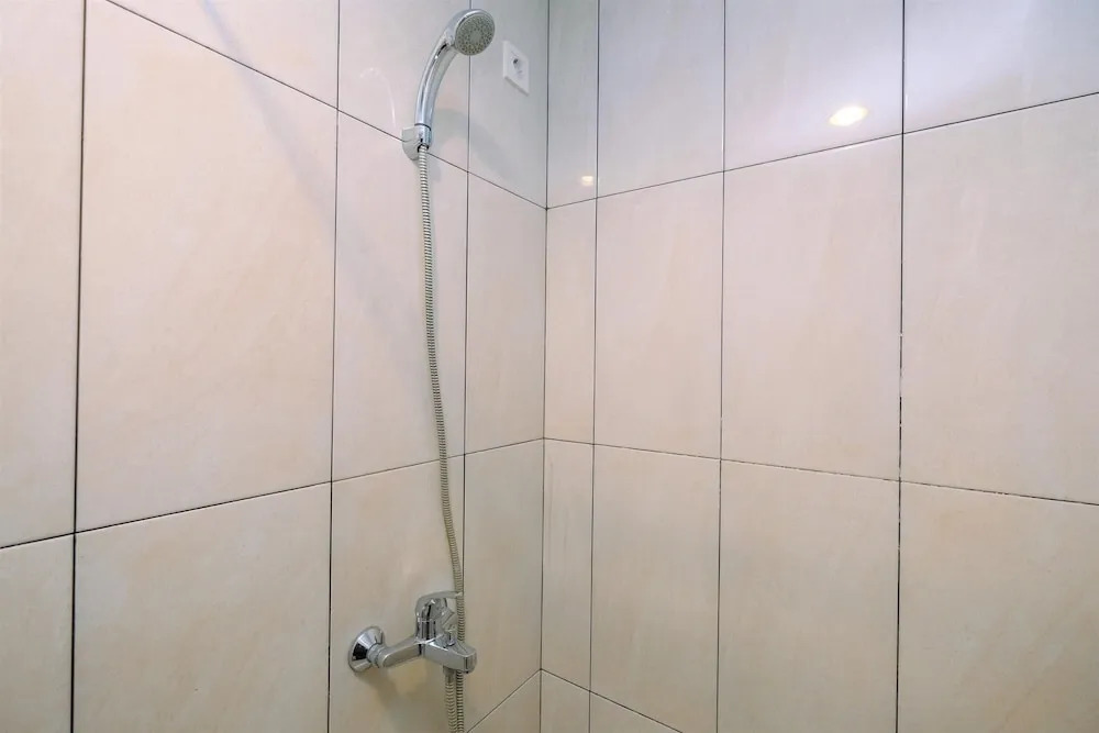Comfort and Best Deal Studio at Grand Kamala Lagoon Apartment By Travelio