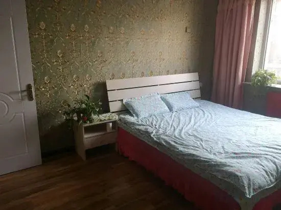 Tiantiansheng Warm Theme Apartment