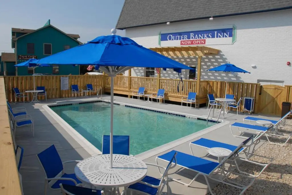 NEW 2026-Ocean Sands Beach Boutique Inn-24Hr Sauna and Salt-Mineral Pool-Free Beach Bikes and Famous Beach-Fresh Baked Cookies-Popcorn-In Room Bathrobes-Sunscreen-65 Inch TVsNetflix-Bedside Candy-Free Laundry- 4 Grand Black Beds-Call & Save-1-252-AHA-SAND