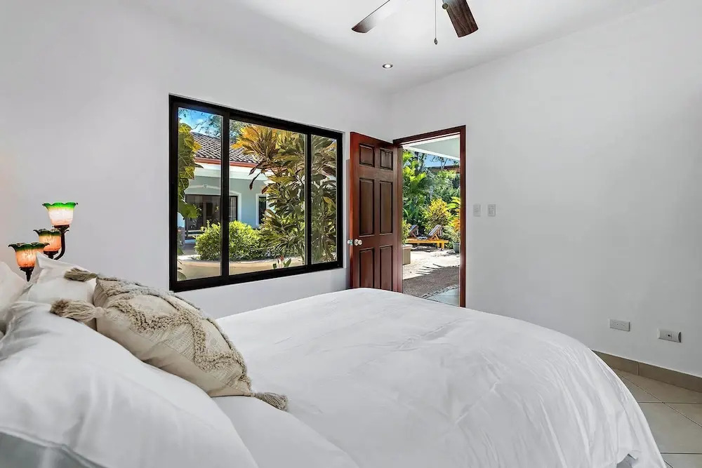 Stylish Home with Chic Decor, Luxury Amenities & Tropical Outdoor Oasis with Sparkling Private Pool