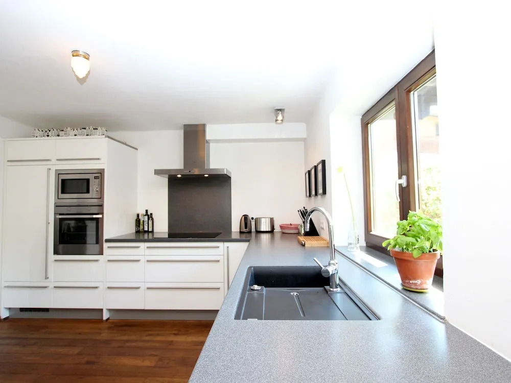Quaint Chalet in Kirchberg with Terrace, Garden, Ski Storage