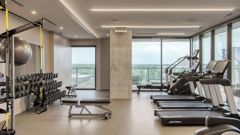 2 Luxury Condos, 1 Block From Rainey St New High Rise w/ Rooftop Pool & Gym
