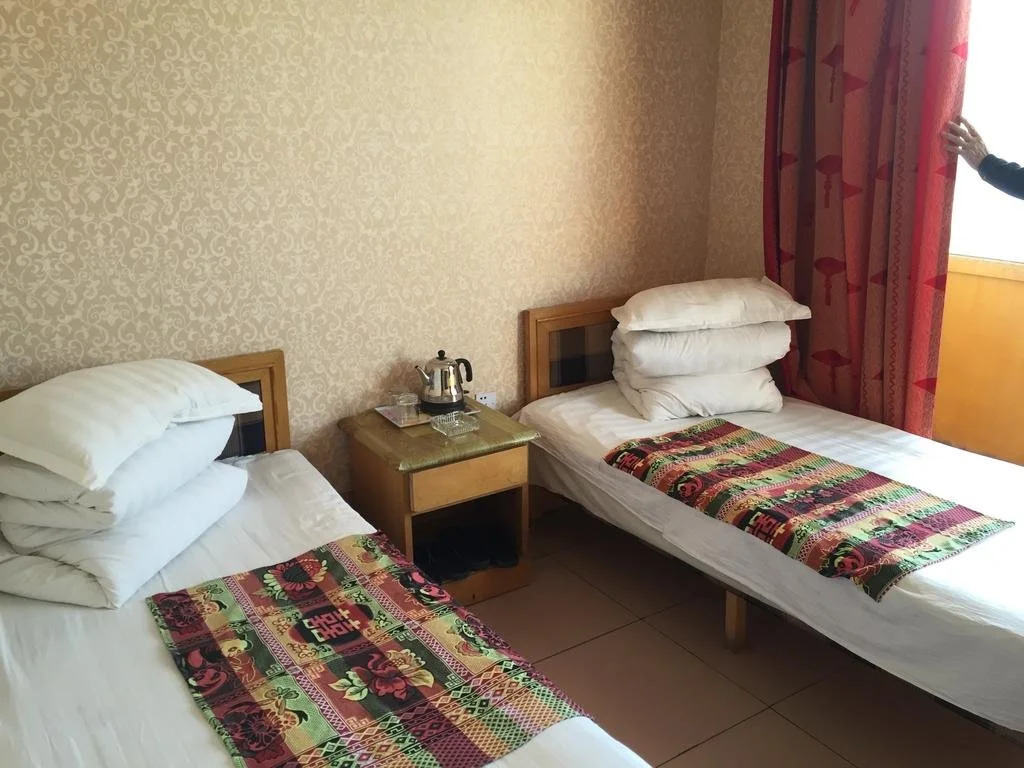 Baotou Qimao Inn