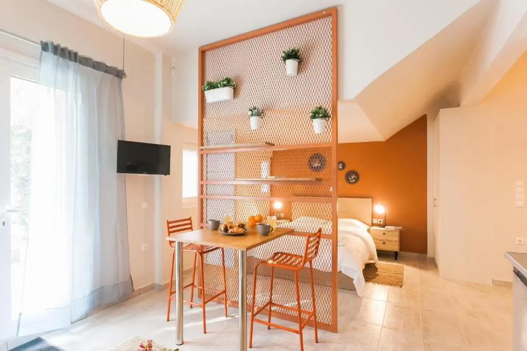 Walk through Athens, based in a local’s hip house!