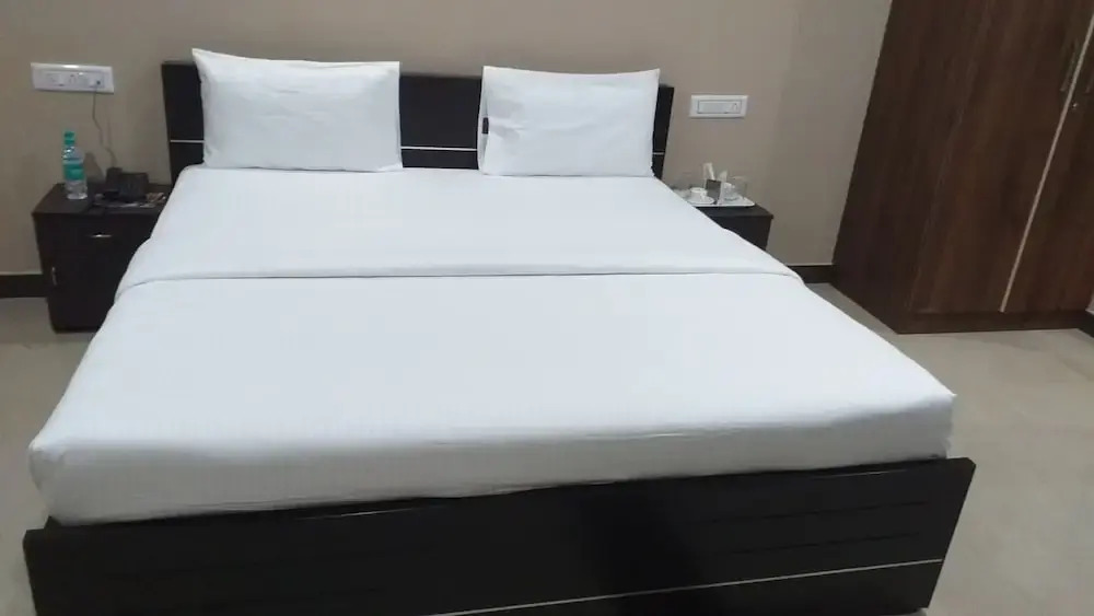the Nisarga Grand   boarding & lodging