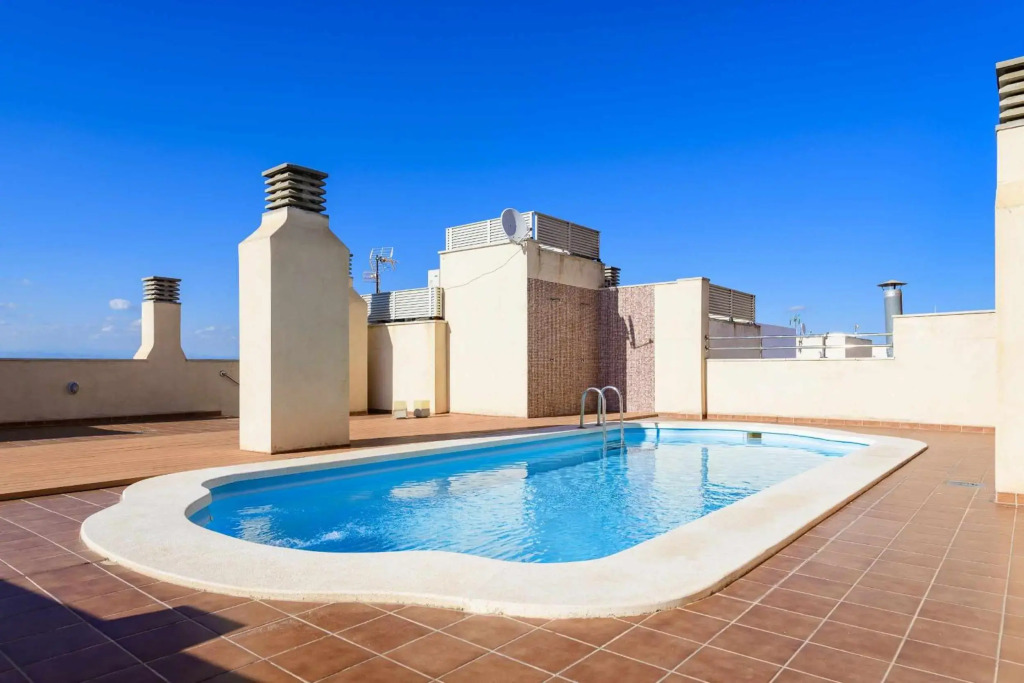 Apart Port Arenal con terraza y piscina