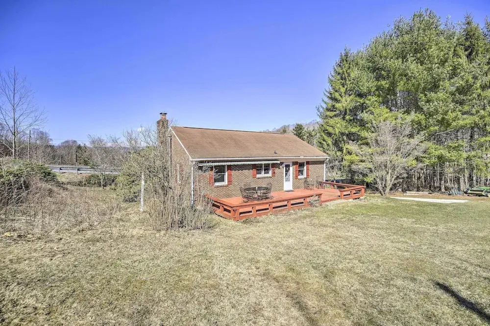 Quaint Creekside Home w/ Spacious Deck & Yard
