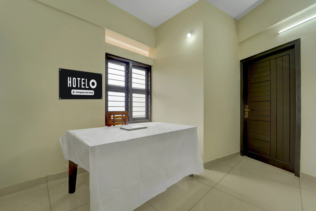 Super Hotel O Engineering College Sreekaryam Formerly B S Plaza