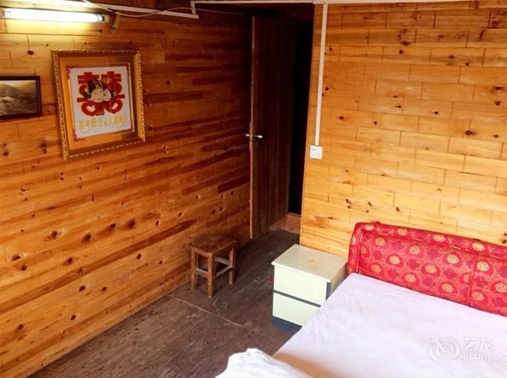 Longsheng Zhaihualou Inn
