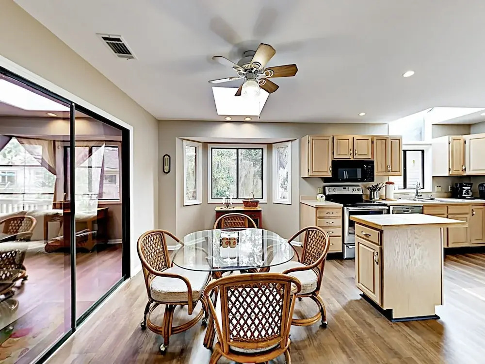 Sunny Coastal-chic W/ Private Deck & Sunroom 3 Bedroom Home