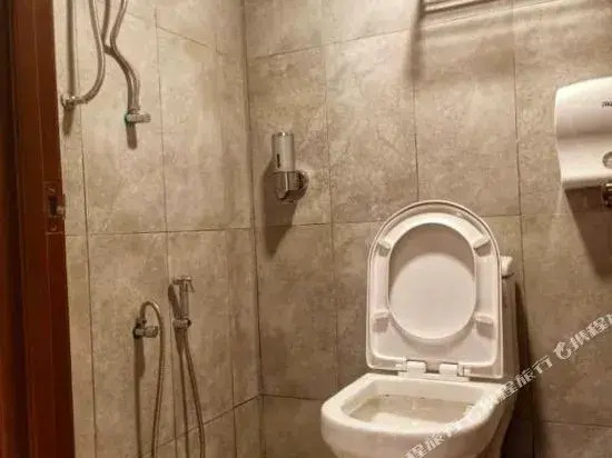 Anggun Lodge Private Room with Sharing Bathroom