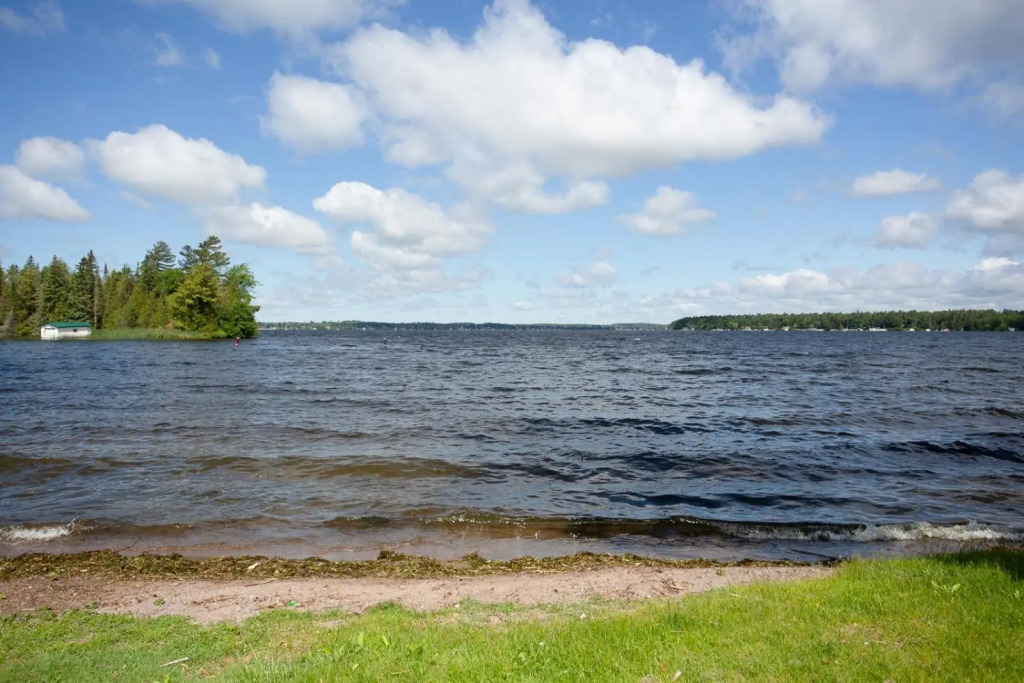 Family Relaxation Place for 2-15 People - 4 Lakeview Cottages with Real Sandy Swimming Beach, Dock, Boats, Firepits, Recreation Room