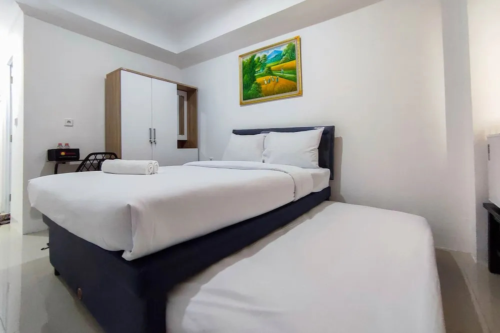 Comfort And Well Design Studio At Paltrow City Apartment