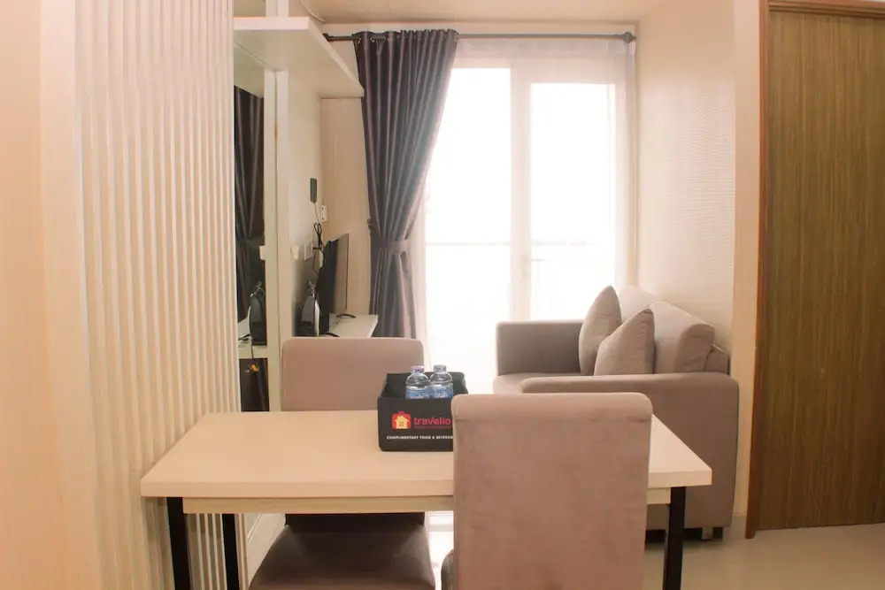 Cozy and Comfort Living 1BR at Oasis Cikarang Apartment By Travelio