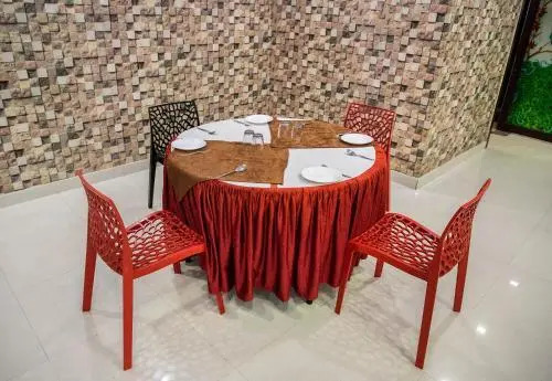Amit Hotel by Clovers Stays