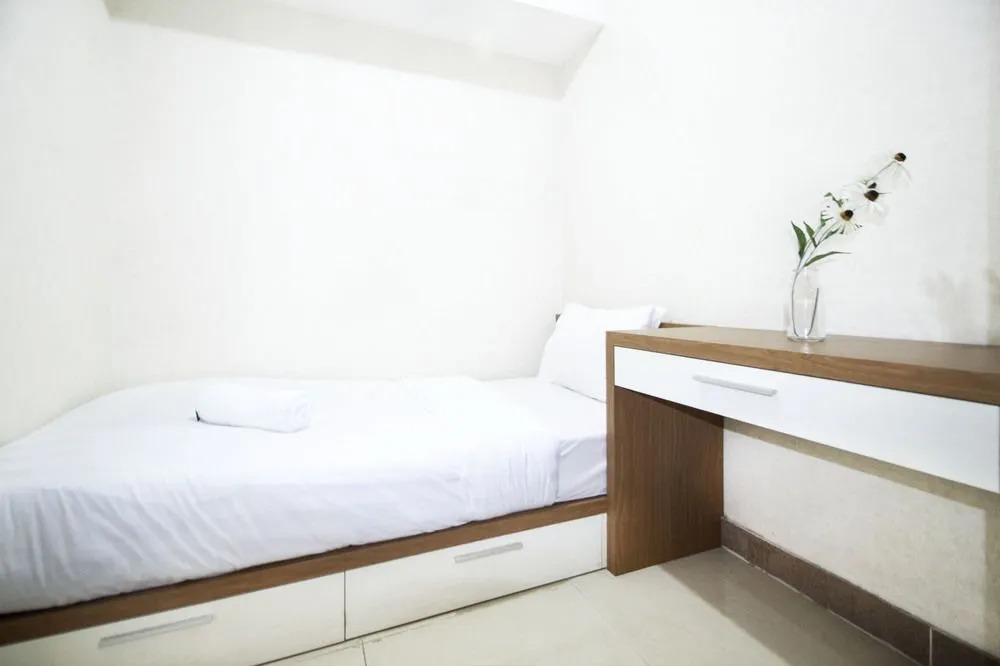 2BR Cozy at Empyreal Epicentrum Apartment By Travelio