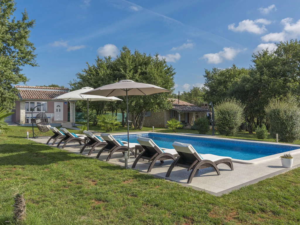 Holiday House with pool, garden, playground and BBQ - surrounded by nature