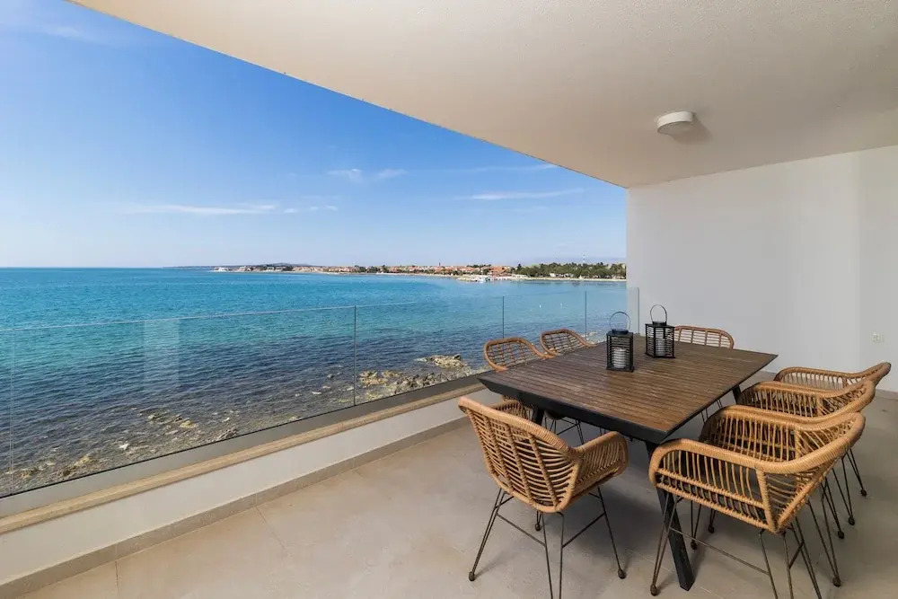 Aqua Blue by Belmont Realty