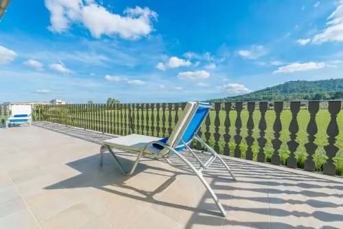 Villa El Palmeral Casa con piscina en Petra