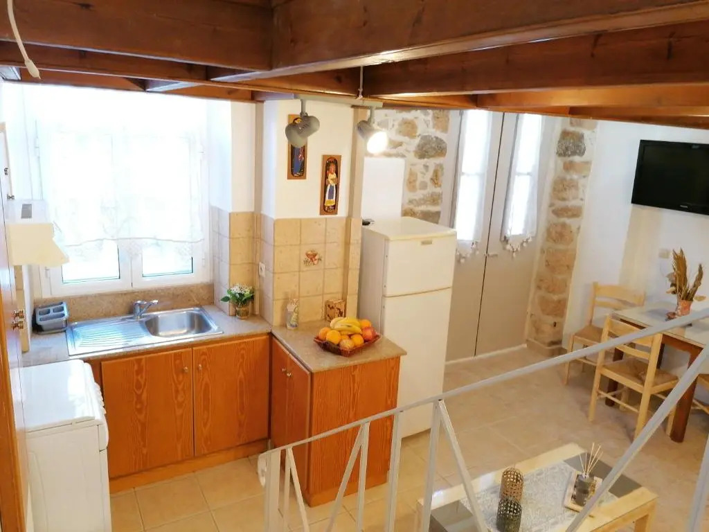 THEOS APARTMENTS