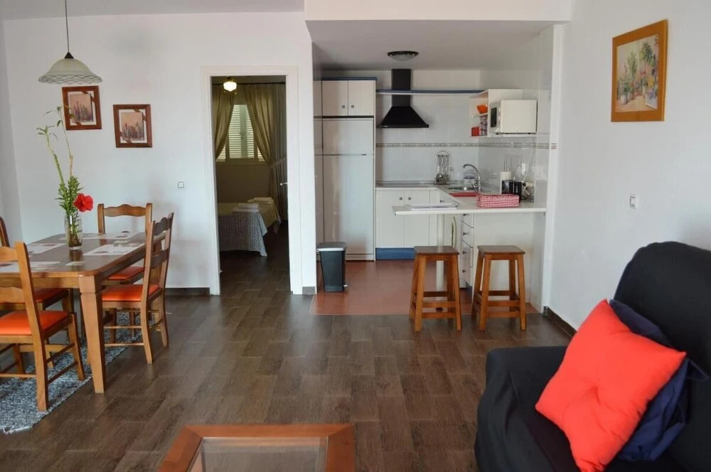 Ground floor apt facing the nudist beach, with private patio & East orientation