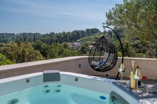 Uniquely designed Villa Ivana with outdoor Jacuzzi nearby the pebble Banje beach at the Island of Solta