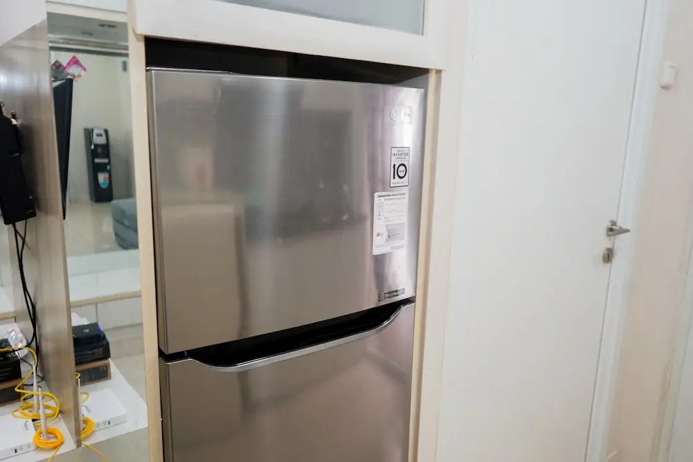 Homey 1BR with City View at Green Pramuka Apartment By Travelio