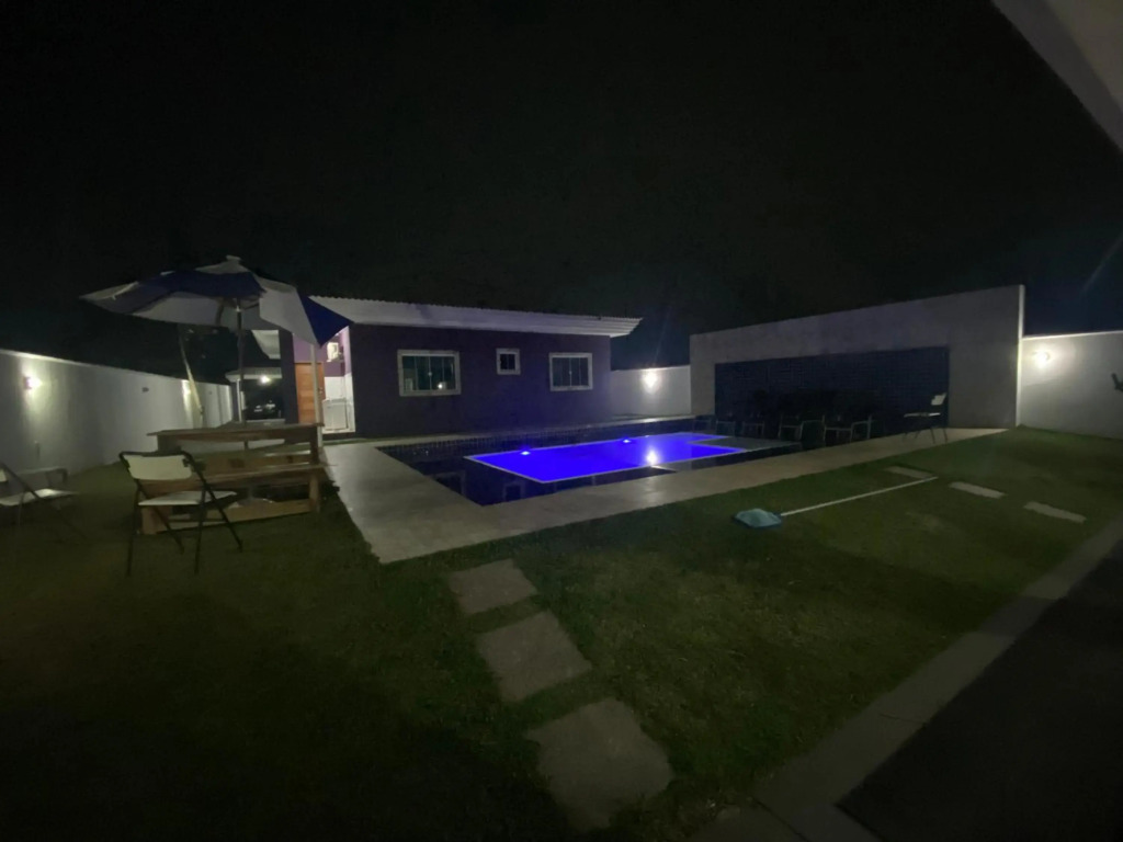 casa de praia com piscina e hidromassagem