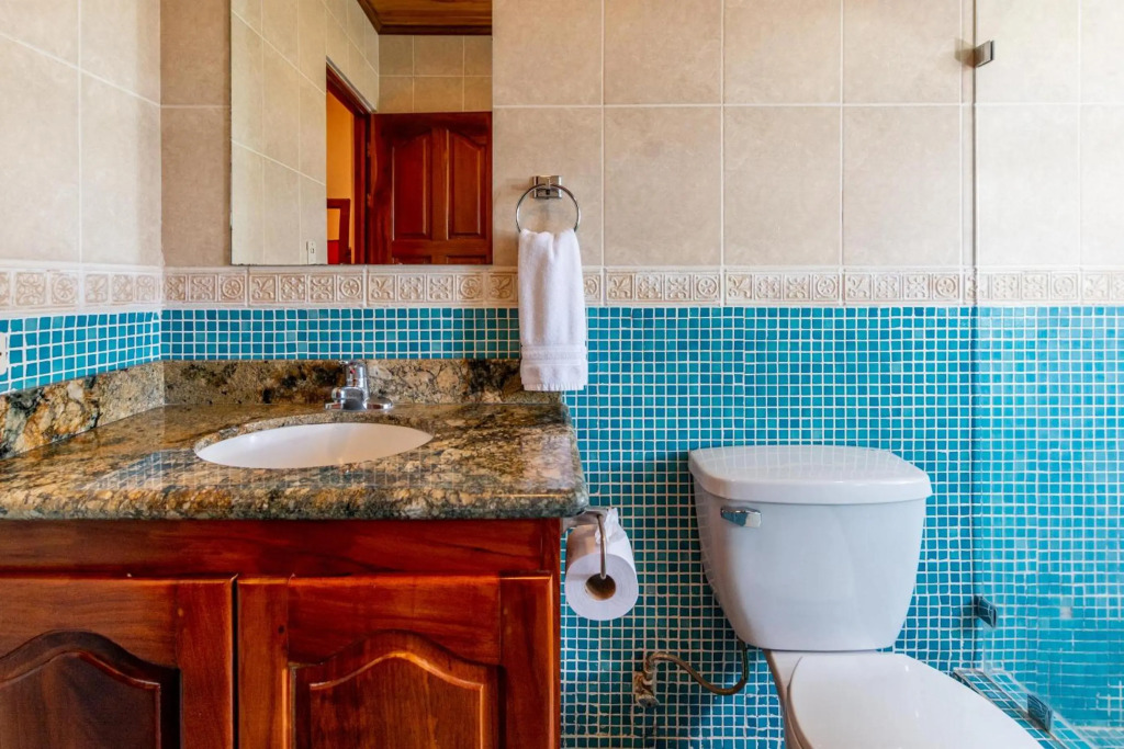Beachfront Condo with Warm, Rustic Interiors & Direct Access to Playa Flamingo